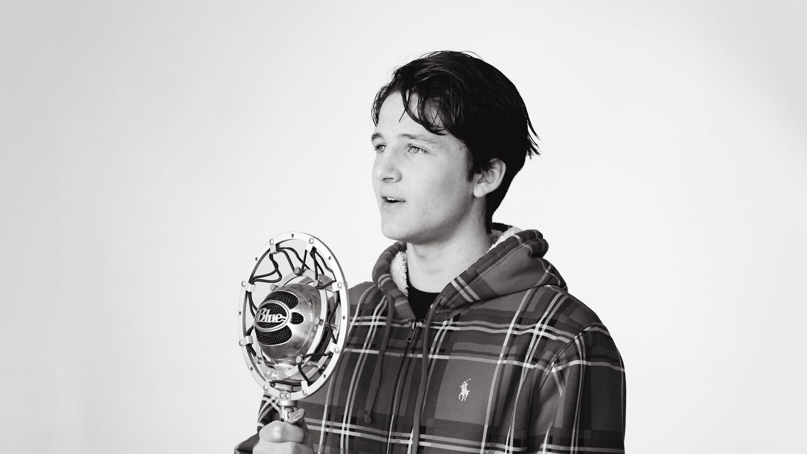 Student speaking into microphone