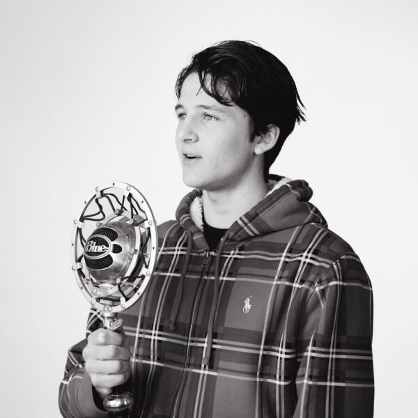 Student speaking into microphone