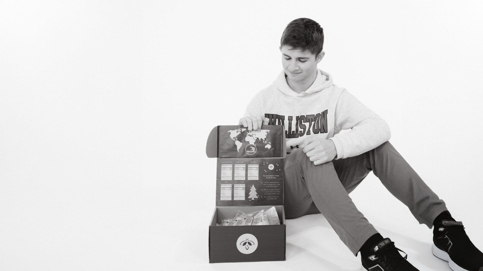 student with box project