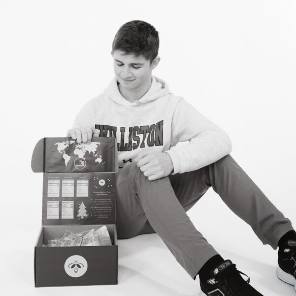 student with box project