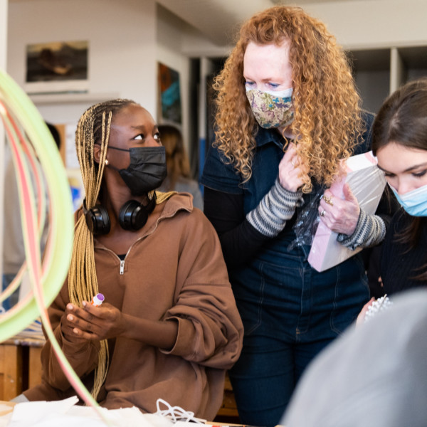 artist and student during project