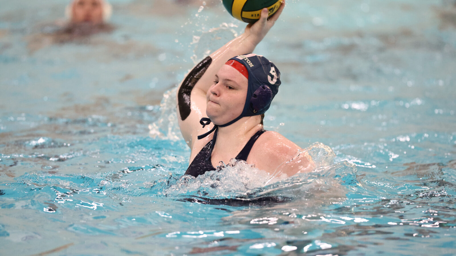 water polo player holding ball