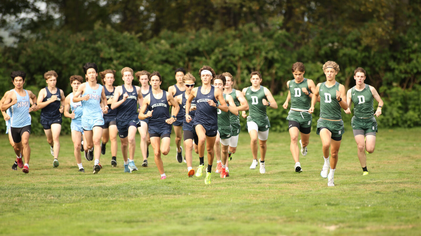 boys running in a cross country race