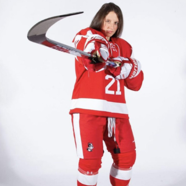 hockey player and two basketball players