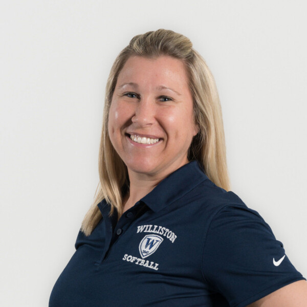 woman in Williston Softball shirt