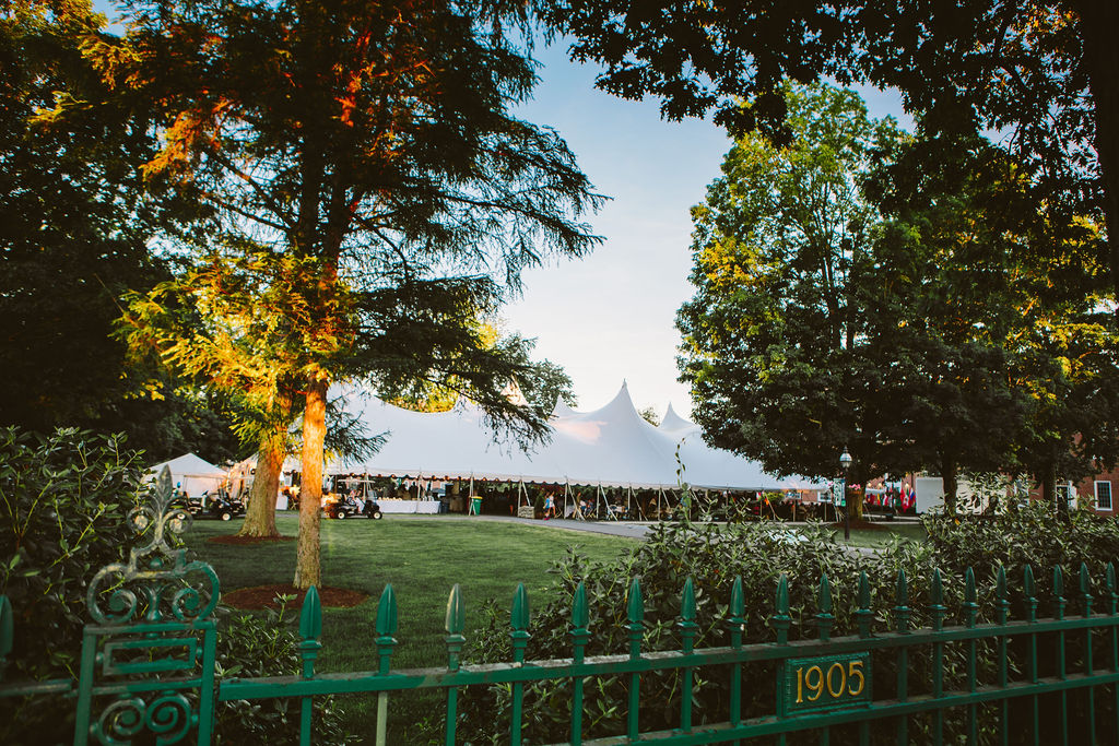 large white event tent on lawn