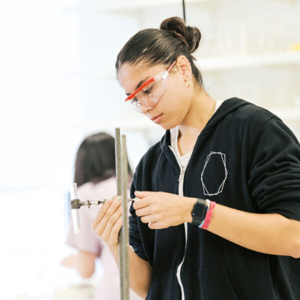 student in science class